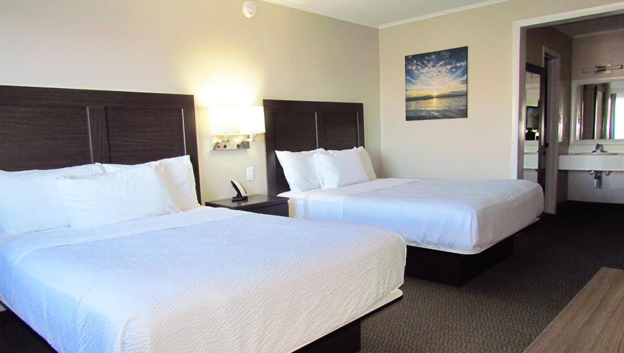 Magnuson Grand Pioneer Inn And Suites Escanaba Buitenkant foto